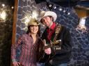 Sylvie with cowboy troubadour Tim Hus (Photo credit: Corkscrew Media)